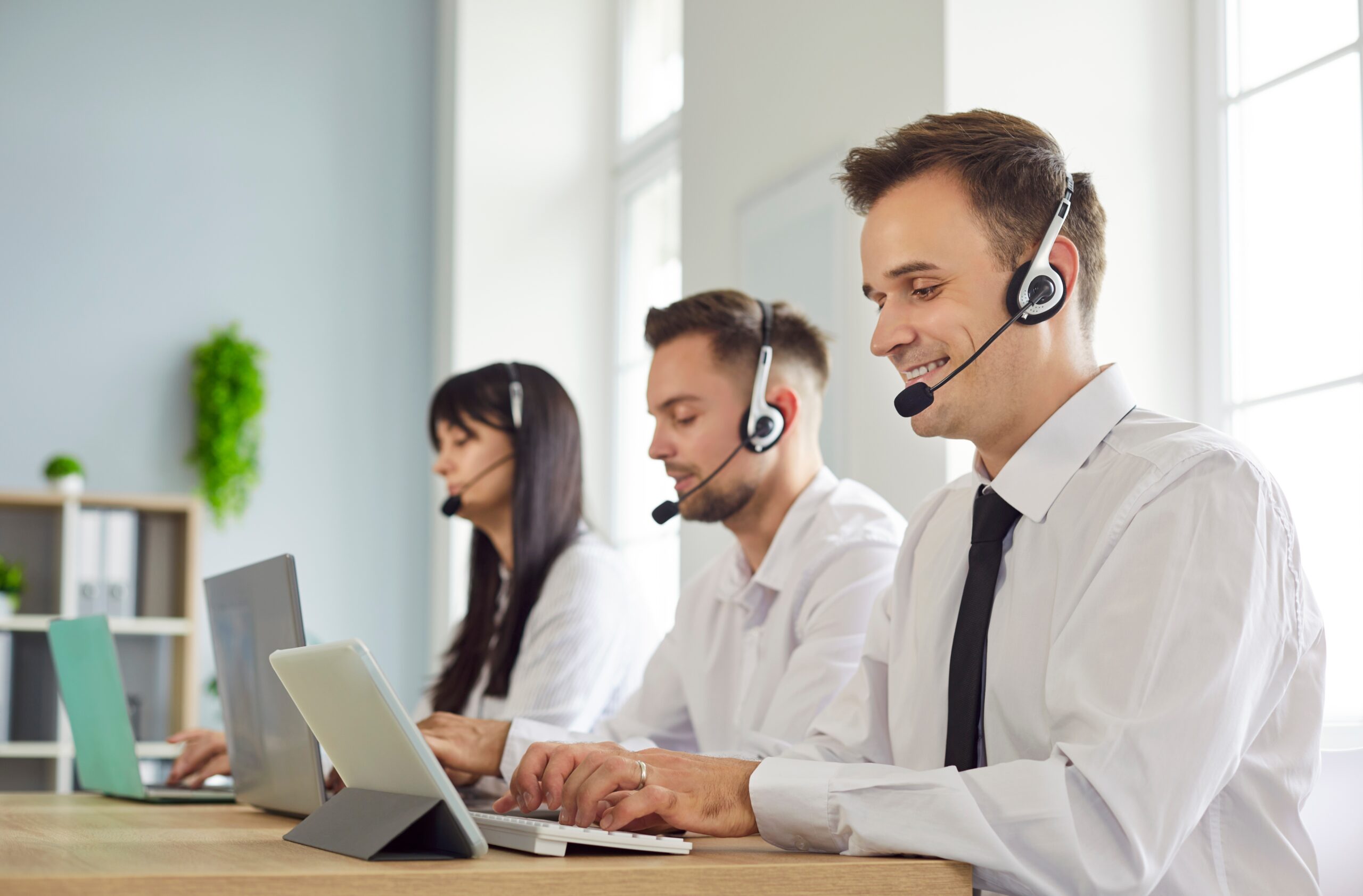 Professional,Team,Of,Call,Center,Agents,In,Headsets,Working,In